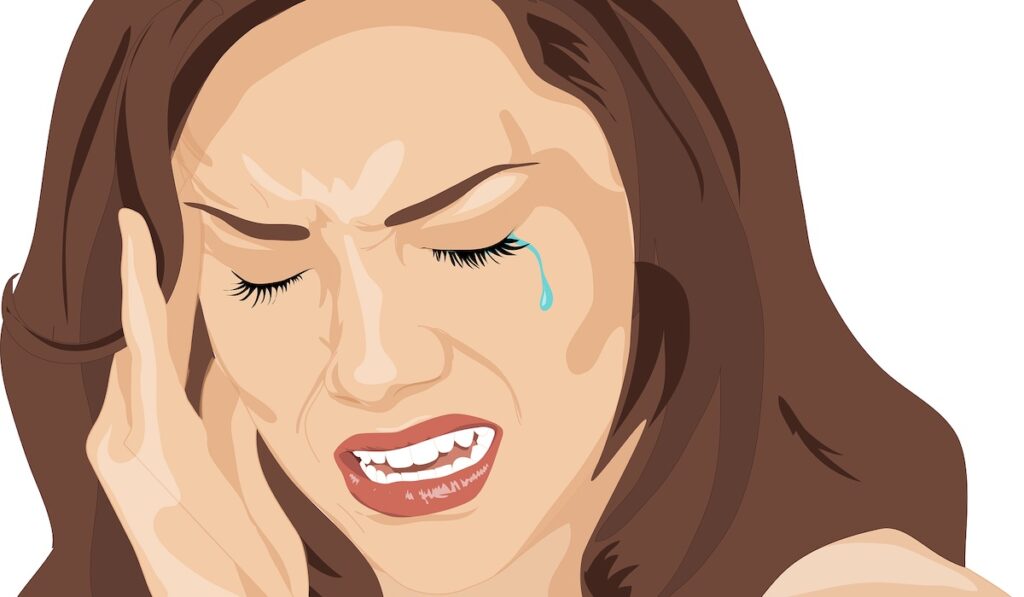 Donna piange dal dolore